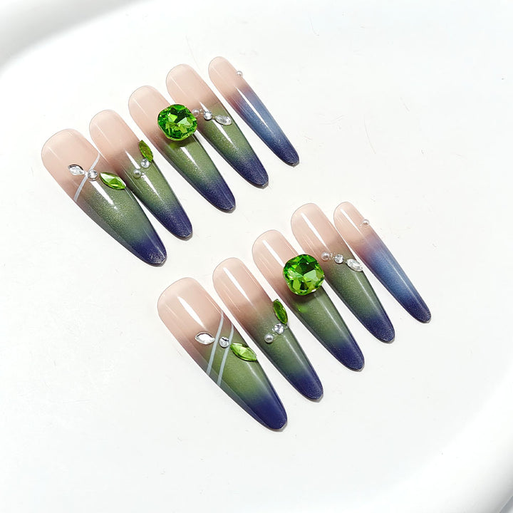 Artifical nails with elegant ombre design and sparkling accents Stornfield