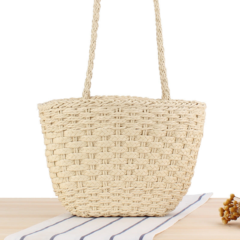 Braided handbag made of natural raffia with robust carrying straps Stornfield