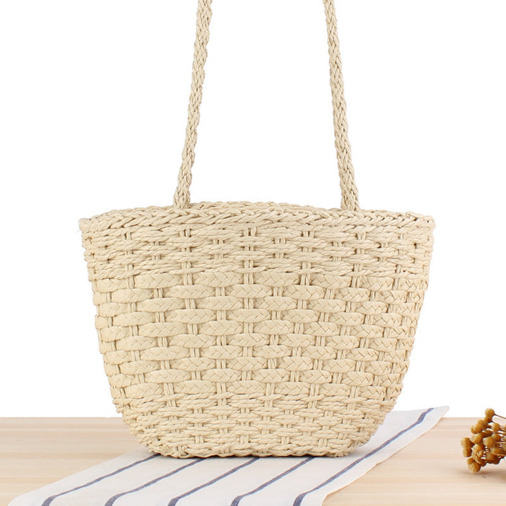 Braided handbag made of natural raffia with robust carrying straps Stornfield