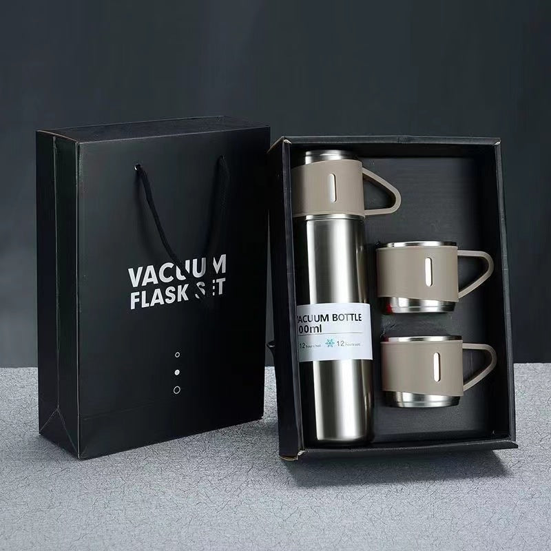 Women’s stainless steel vacuum flask with two accompanying cups Stornfield