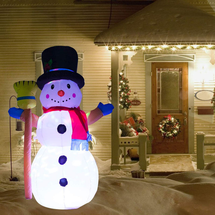 Inflatable snowman with hat and broom