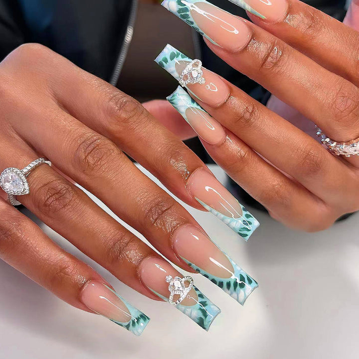 Exquisite artificial nails with jewelry details Stornfield