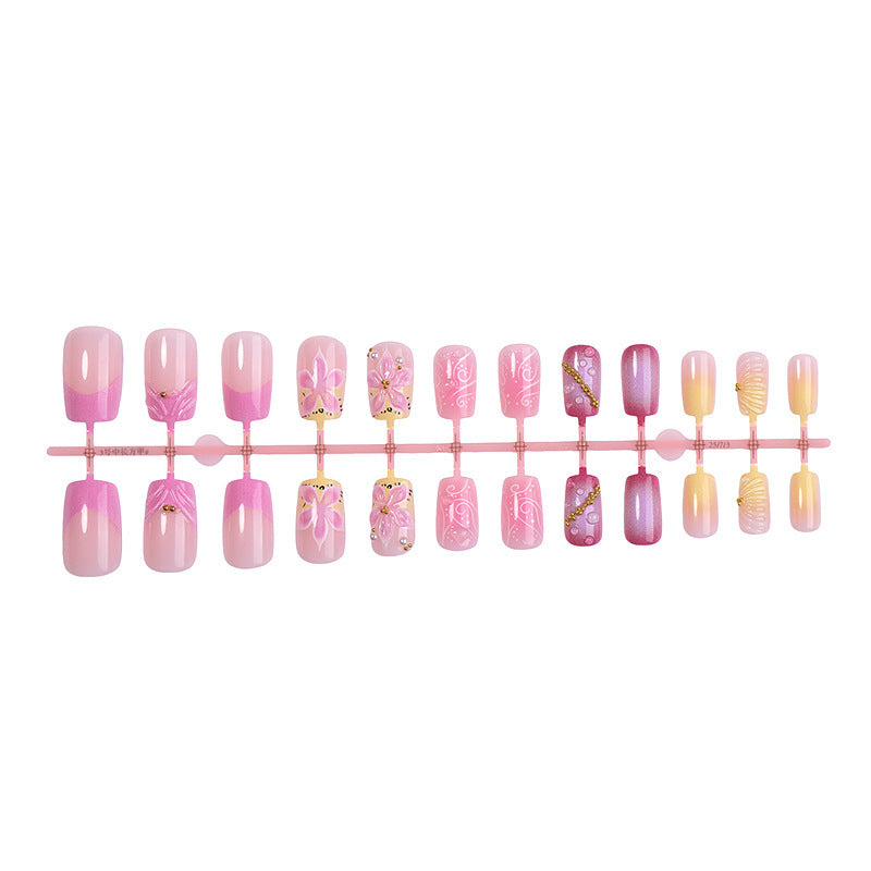 Artificial nail set with floral and glamorous designs Stornfield