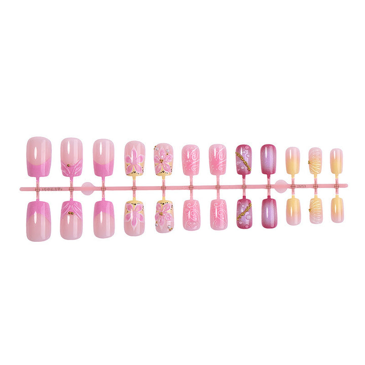 Artificial nail set with floral and glamorous designs Stornfield