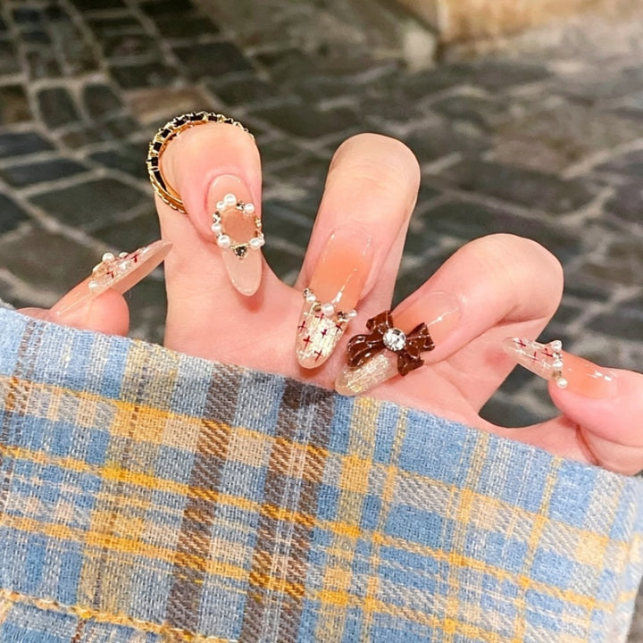 Decorative Bow and Gemstone Press-On Nails Stornfield