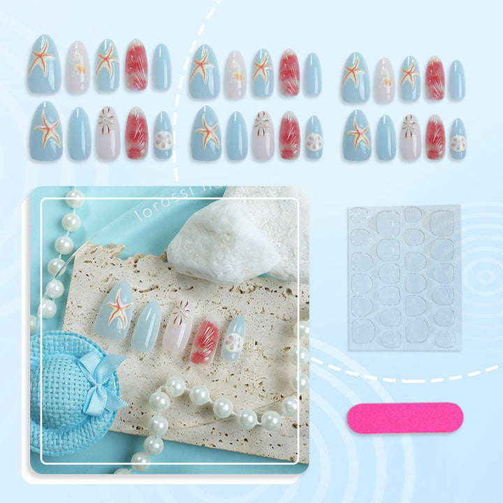 Artificial nails with maritime shell motifs Stornfield