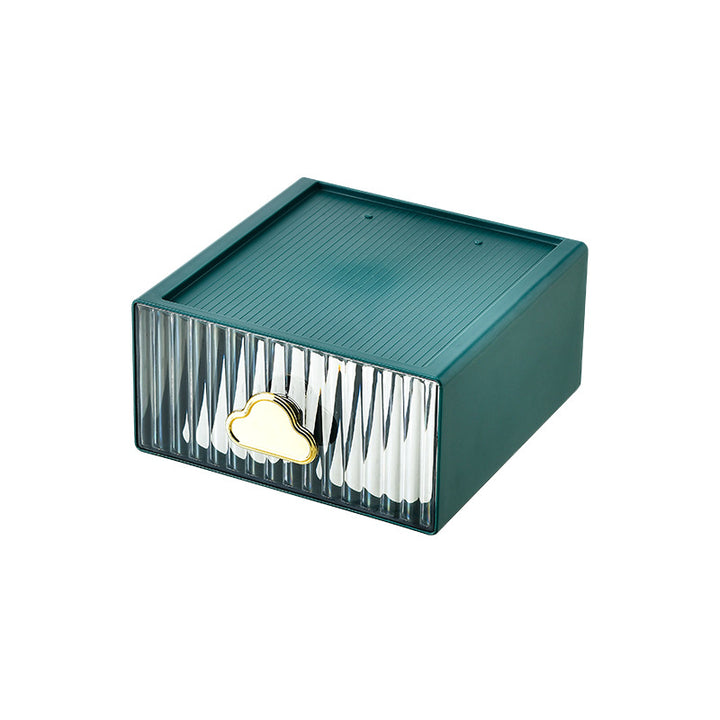 Small jewelry storage box with ribbed front and decorative cloud handle