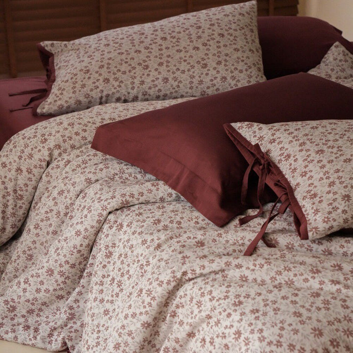 Luxurious bedding set with floral microprint percale and satin finish back