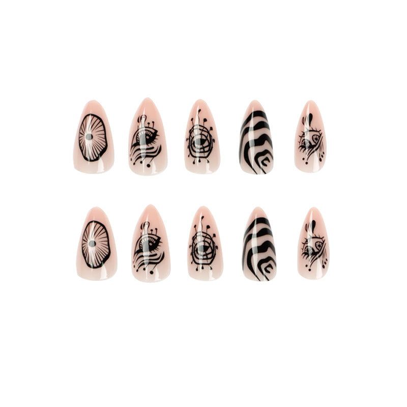 Artistic acrylic nails in elegant stiletto design with graphic patterns Stornfield