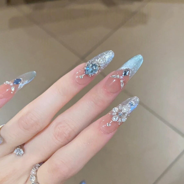 Glamorous artificial nails with sparkling rhinestone accents Stornfield