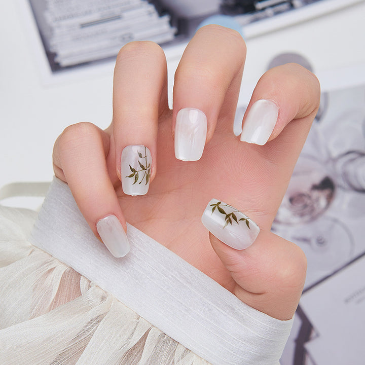 Artistic nail extensions with floral accents Stornfield