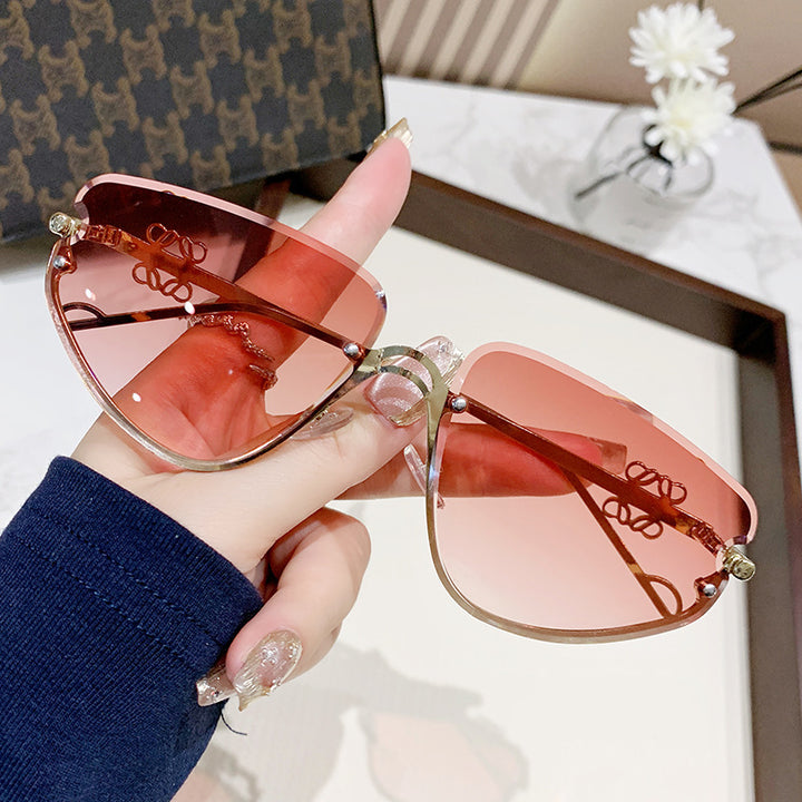Ladies extravagant sunglasses with modern, geometric frame Stornfield