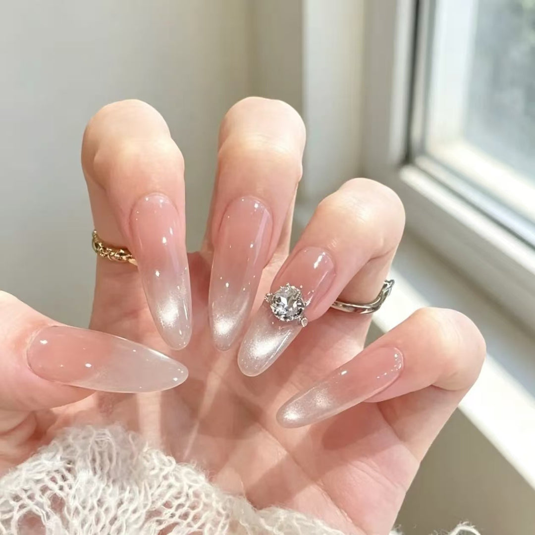 Elegant Stiletto Nail Extensions with Crystal Accent