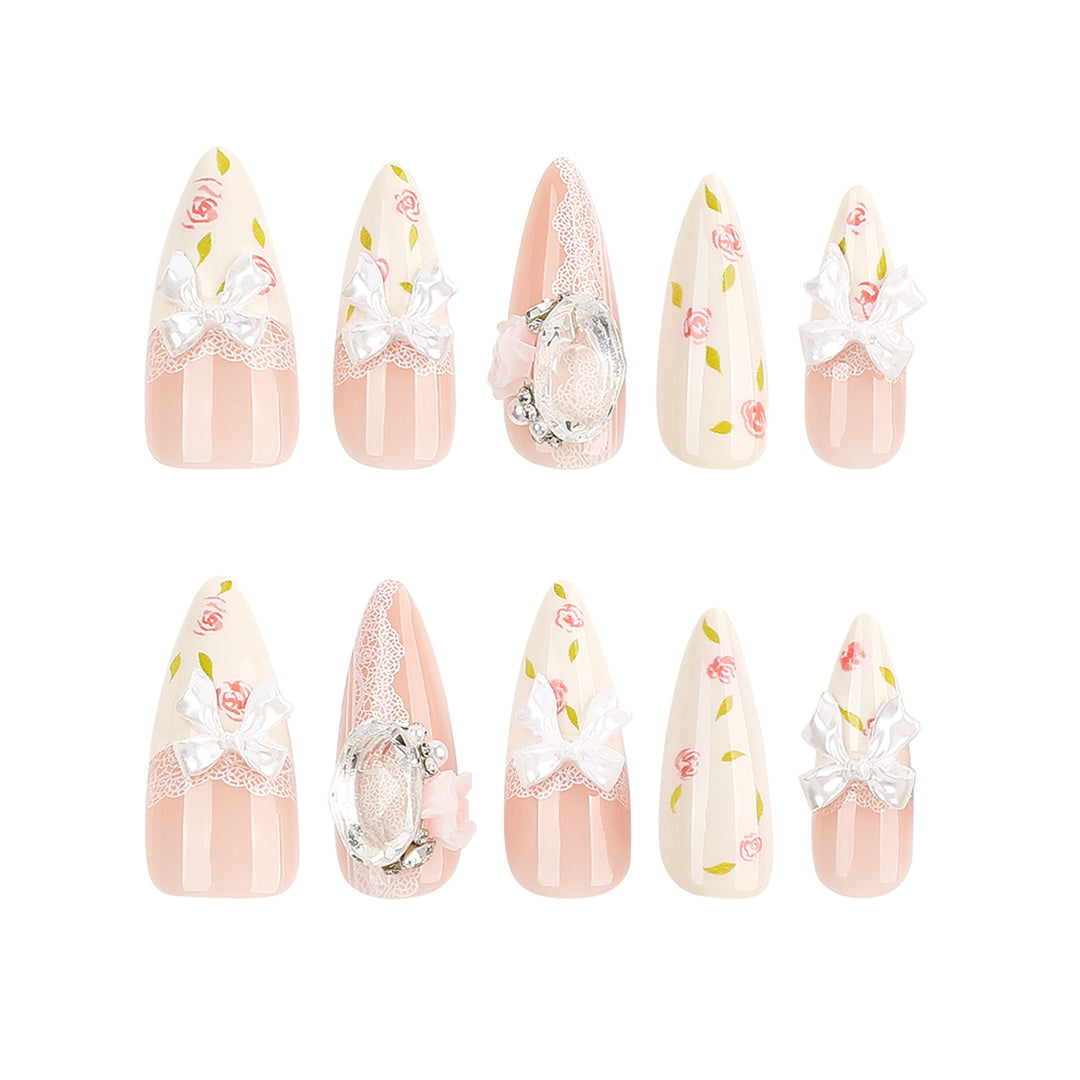 Artful stiletto nails with floral accents and glitter accents Stornfield