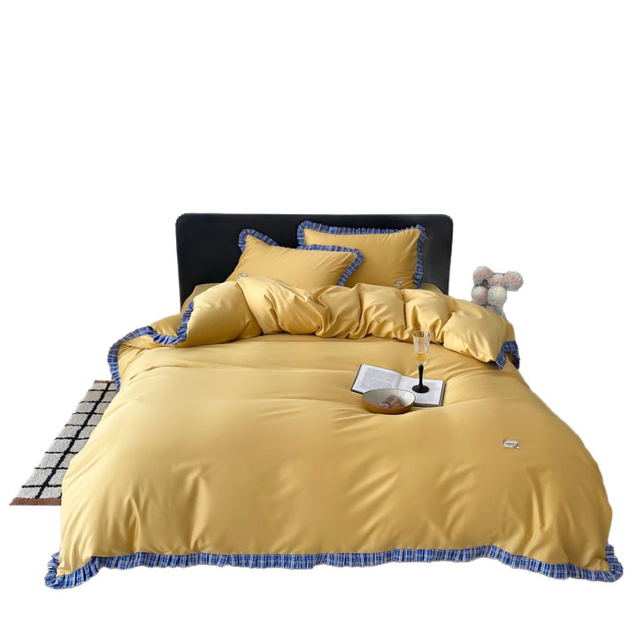 Luxury cotton bedding set with ruffle trim and checkered edging