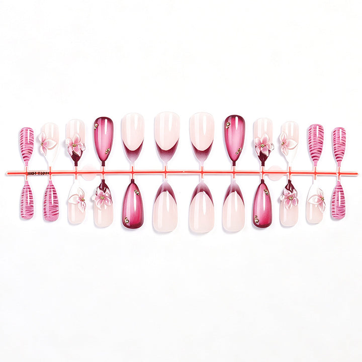 Artificial nail set with floral accents and ombre effect Stornfield