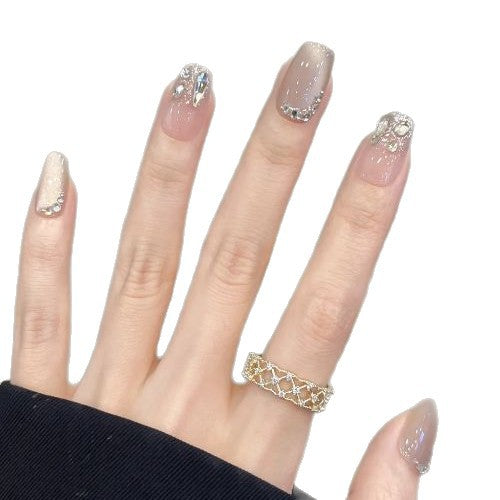 Artificial nails with sweet animal motif and elegant French tip Stornfield
