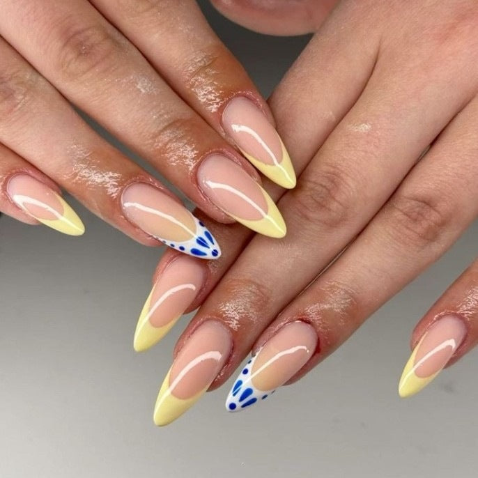 Artistic Stiletto Nail Design with Gradient Tips