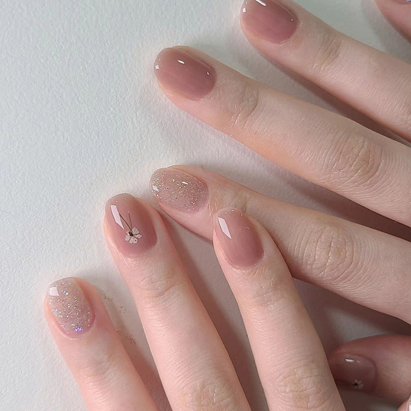 Artificial nails with sparkling accents and floral design Stornfield