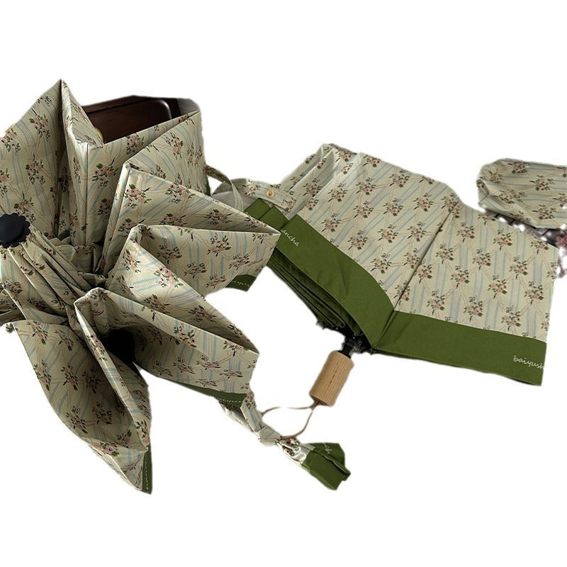 Ladies elegant folding umbrella with floral design Stornfield