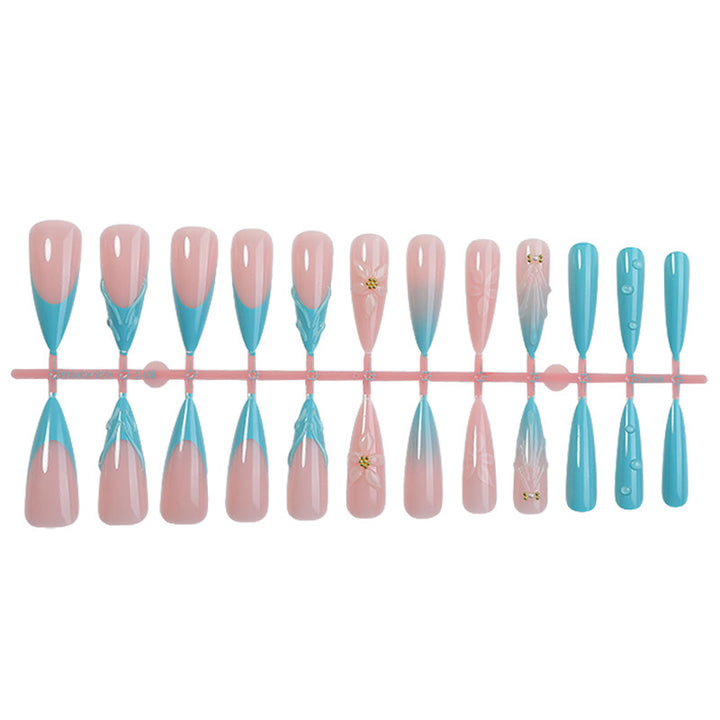 Nail set with filigree designs Stornfield