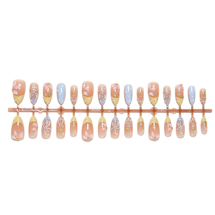 Artificial nails with floral motifs and glitter details Stornfield