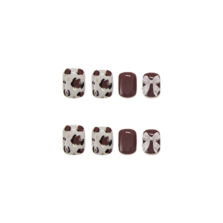 Artful nail tips with elegant foil decorations Stornfield
