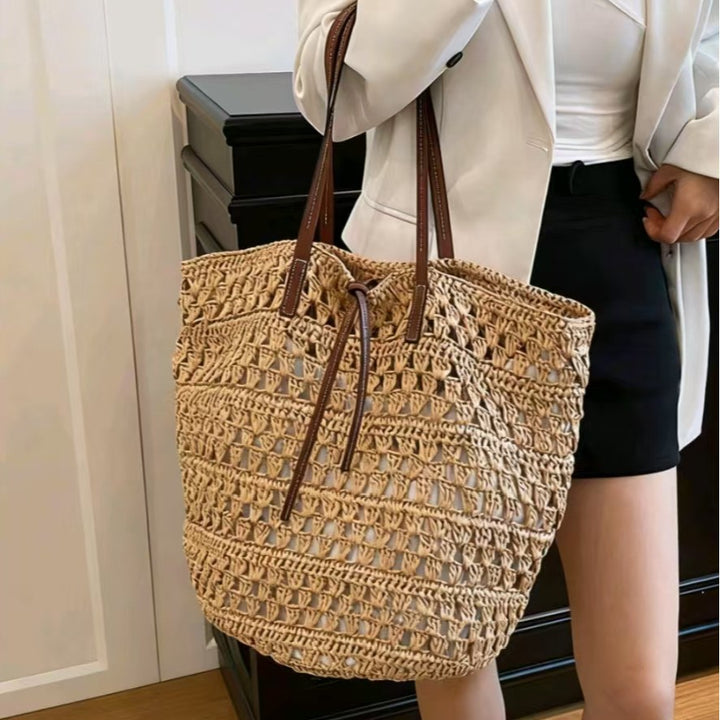 Woven natural material handbag with leather handles Stornfield