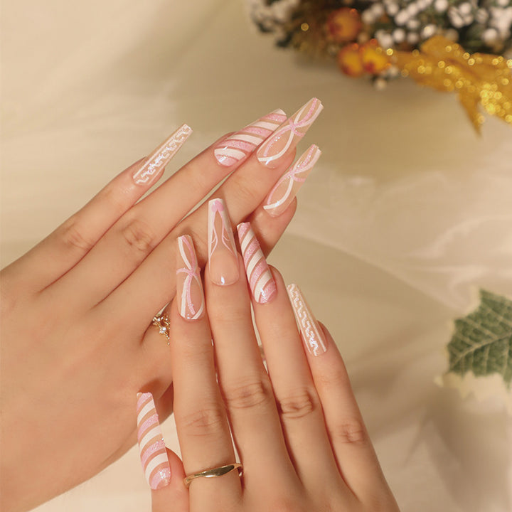 Translucent artificial nails with delicate patterns Stornfield