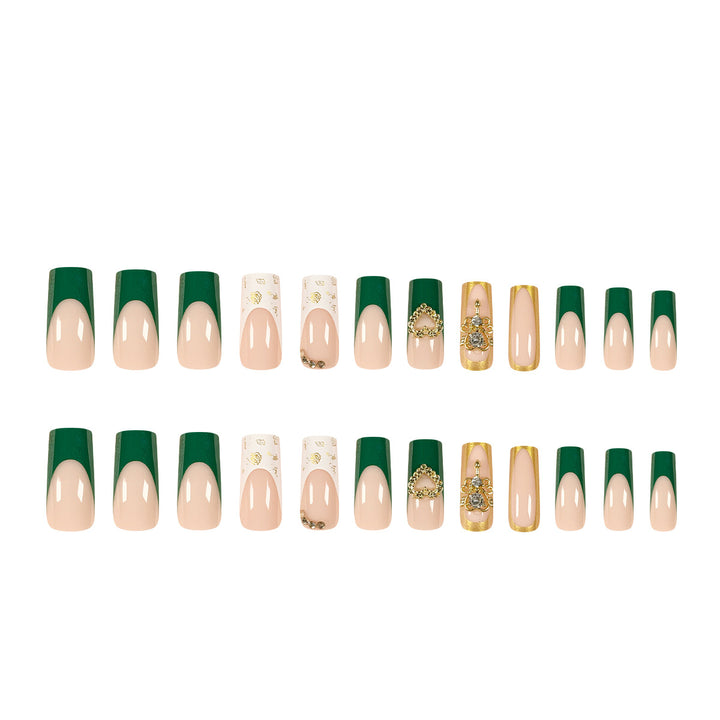 Exquisite artificial nails with gold embellishments and glitter accents Stornfield