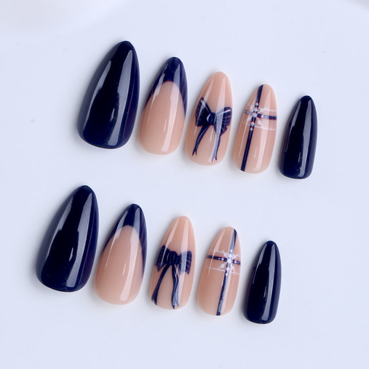 Artificial nails with elegant bow and geometric design Stornfield