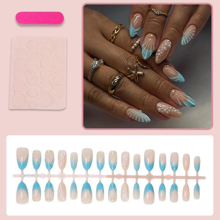 Art nail set with elegant shell and pearl decorations Stornfield