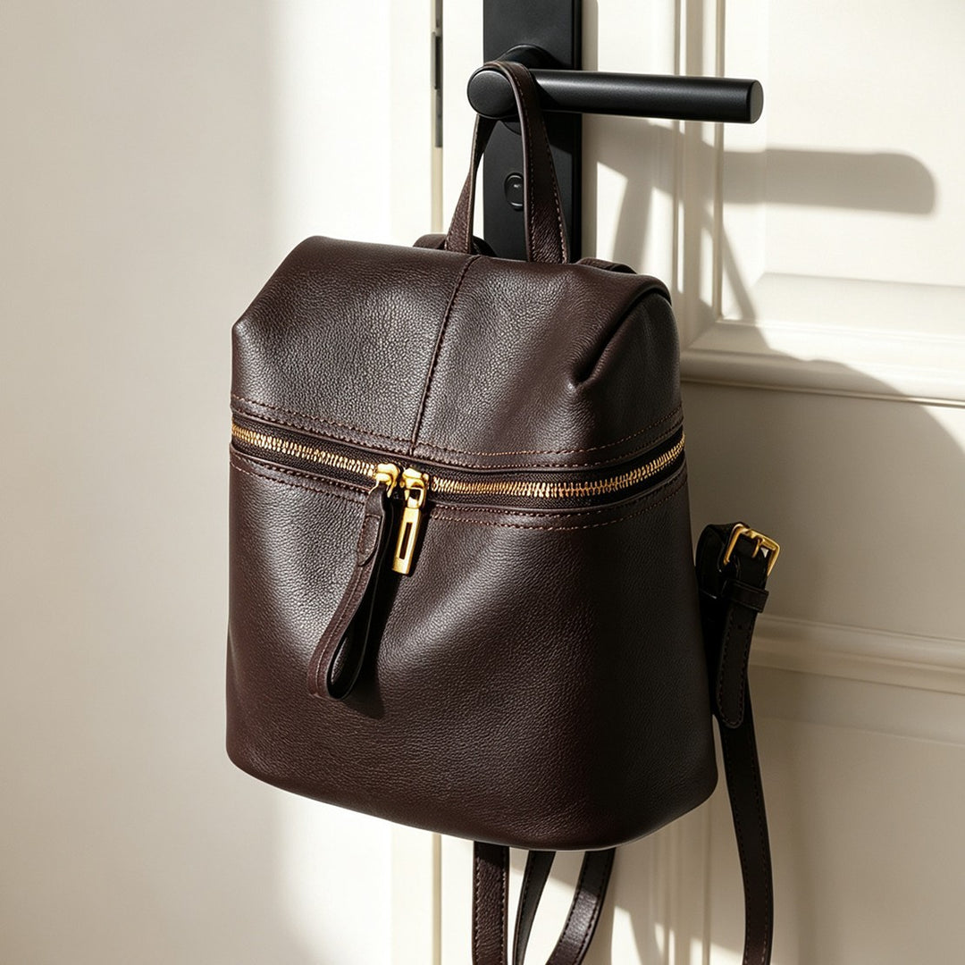 Small Structured Pebbled Leather Mini Backpack with Front Zip Pocket and Top Handle