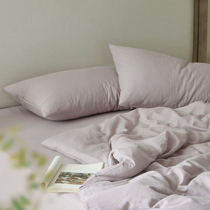 Light bed linen set made of washed linen-cotton blend with a natural texture
