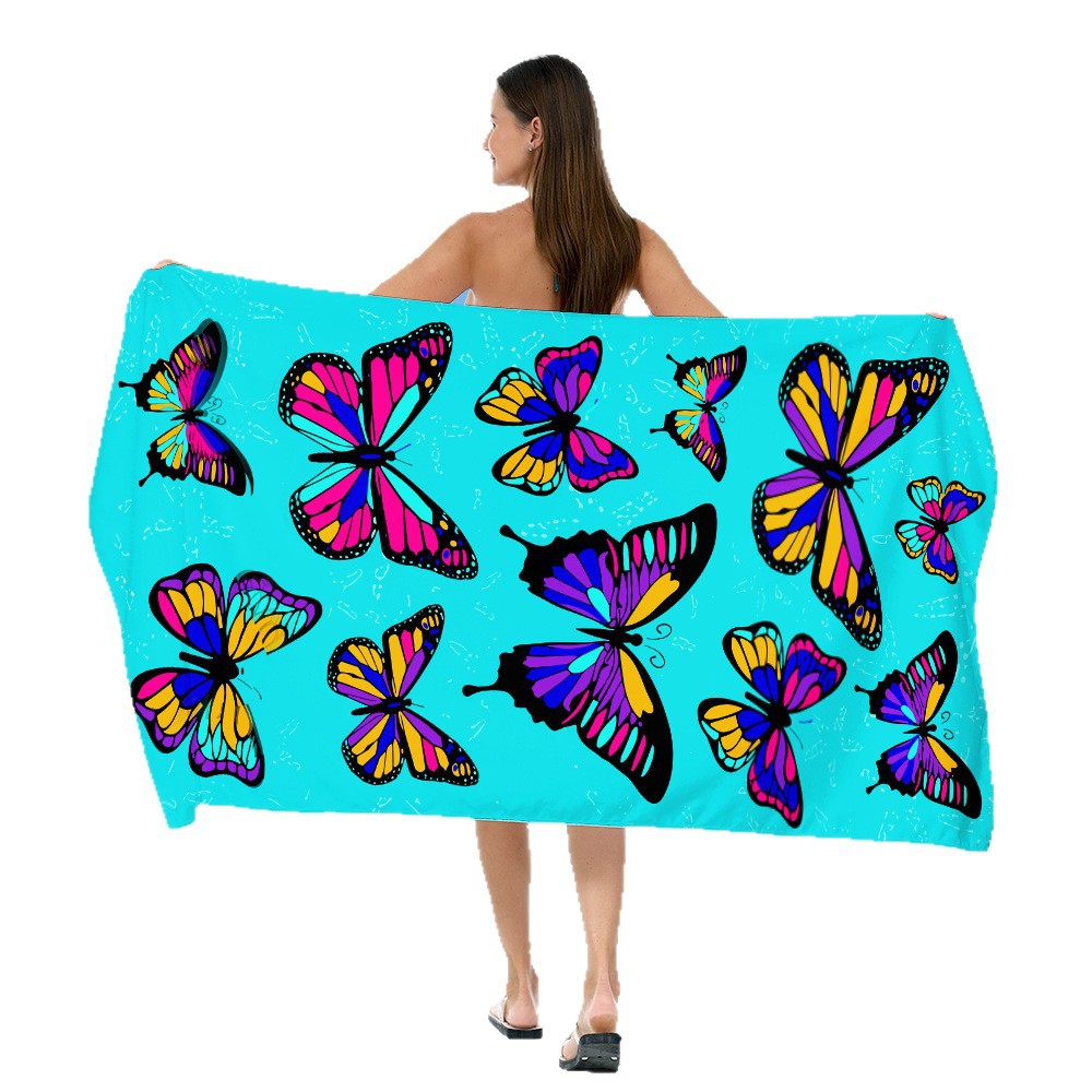 Beach towel with vibrant, colorful animal motif Stornfield