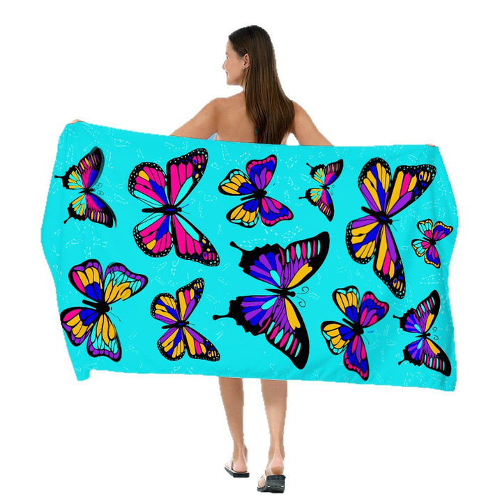 Beach towel with vibrant, colorful animal motif Stornfield