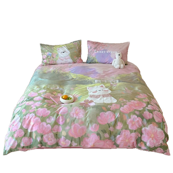 Children's bedding set with applied cat detail, watercolor flower print, and extra soft cotton blend