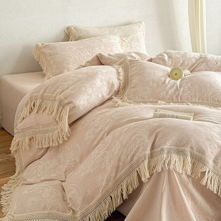 High-quality jacquard bed linen set with decorative fringed trim made of cotton satin