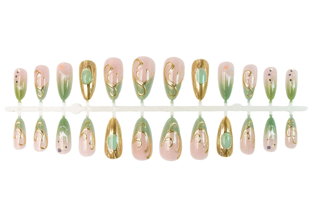 Nail art set with elegant gold accents and floral designs Stornfield