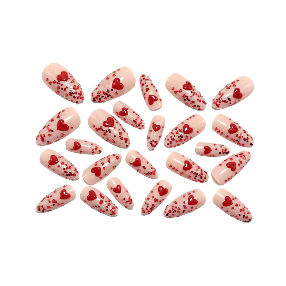Artificial nails with sparkling heart design and glitter coating Stornfield