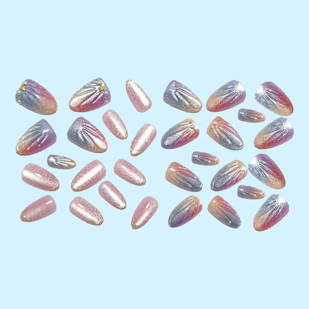 Artificial nails with glitter accents and elegant decorations Stornfield