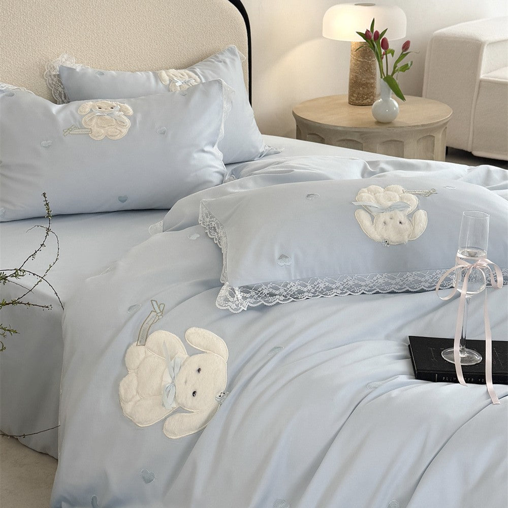 Luxurious bedding set made of cotton satin with embroidered plush bunny and lace trim