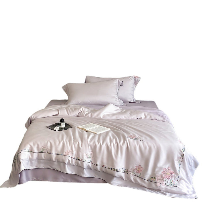 Luxurious silk bedding set with embroidered floral design