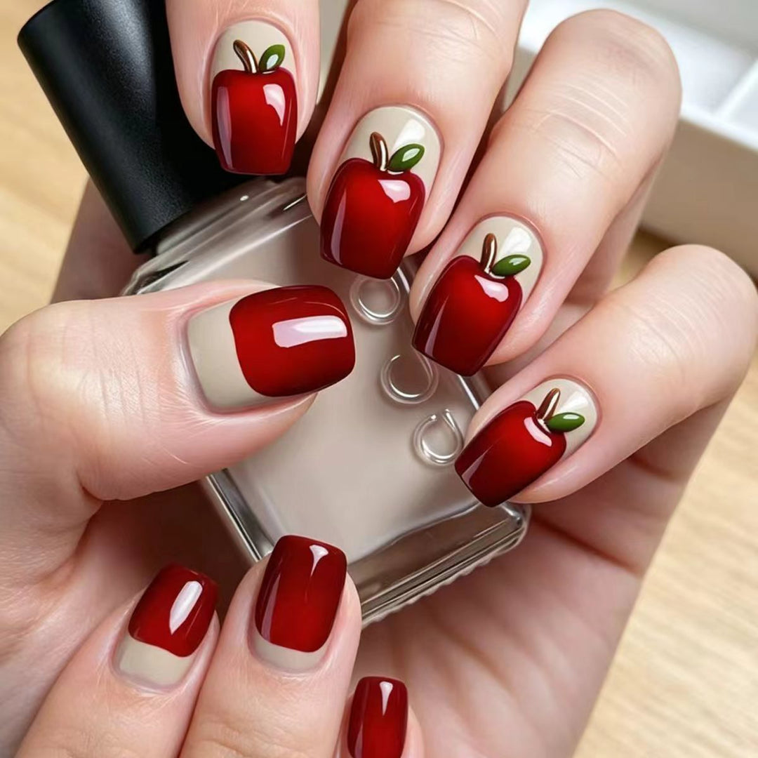 Artificial nails with playful apple motif Stornfield