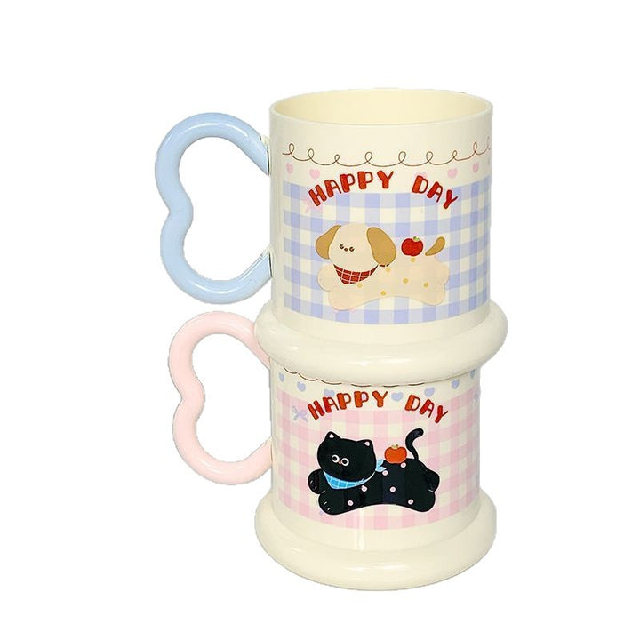 Ceramic mug with playful puppy motif Stornfield