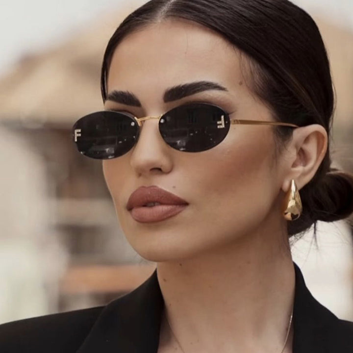 Women's fashionable sunglasses with elegant, round lenses and delicate metal frame Stornfield