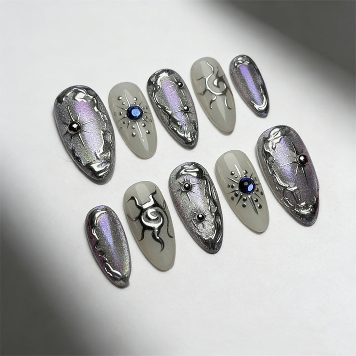 Acrylic nail set with holographic accents and elegant embellishments Stornfield