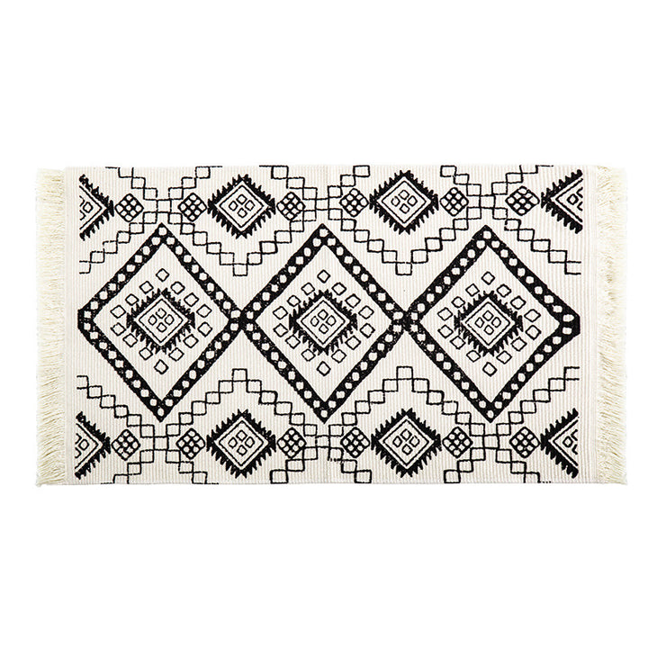 Flat-woven runner rug in ethnic stripe design with hand-fringed edge