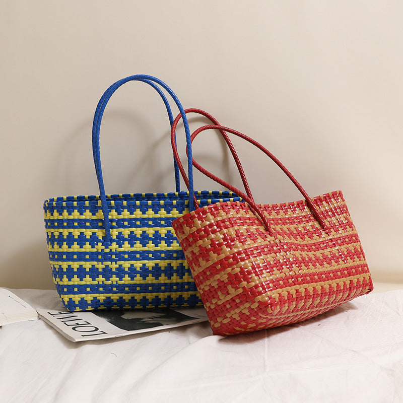 Braided straw bag with color-contrasting stripes Stornfield