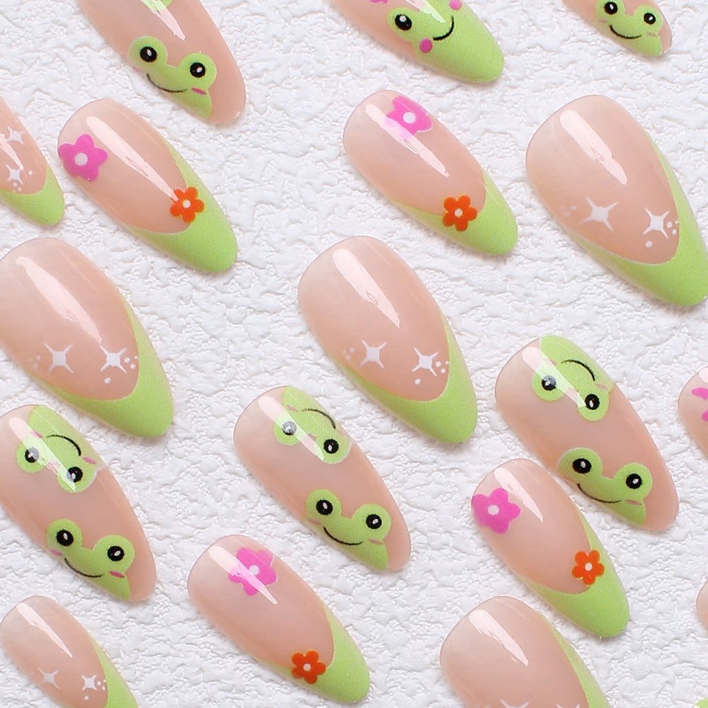 Artificial nail set with creative frog designs and playful accents Stornfield